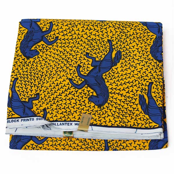 Yellow Hollantex fabric with blue horse print 3 Close-up of Yellow Hollantex Fabric with Blue Horse Print showing horse design