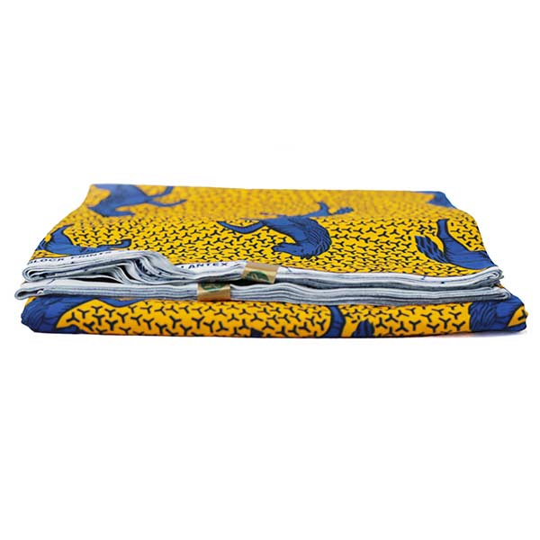 Yellow Hollantex fabric with blue horse print 4 Close-up of Yellow Hollantex Fabric with Blue Horse Print showing horse design